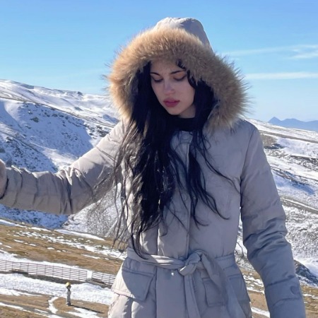 Cristina Kovani enjoying her time traveling in the mountains.